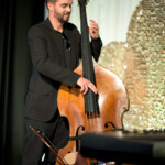 Man playing double bass on stage